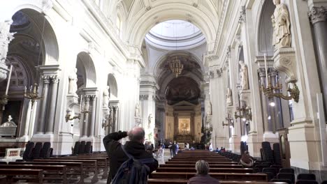 grand cathedral interior with people