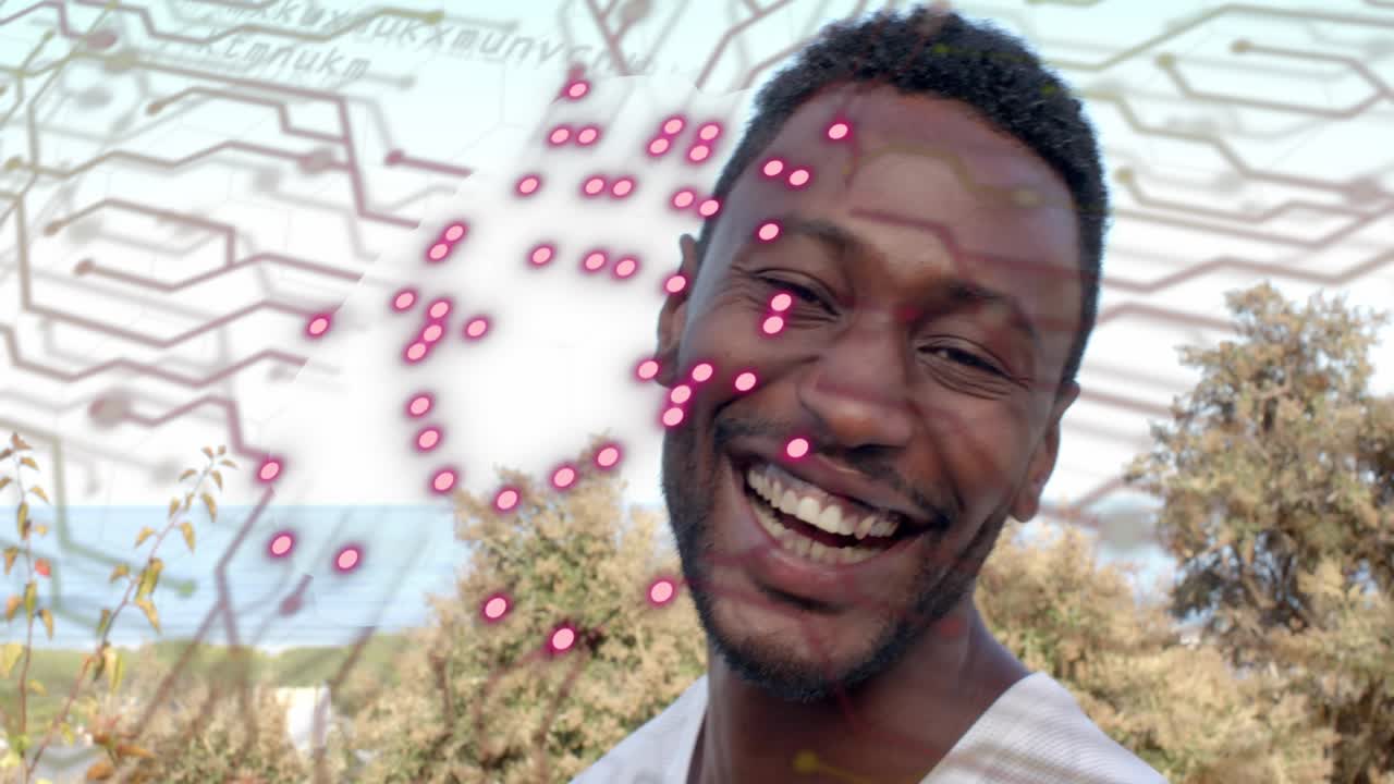 Adult man smiling on coast neon-pink circuit overlay appearing from left, expanding breaking for IT