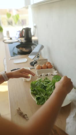 woman preparing a healthy breakfast in a modern kitchen