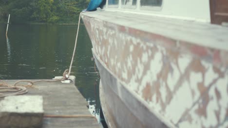 sanded mahogany planked hull of a wooden boat