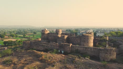 aerial drone shot of a gurjar dynasty indian fort in gwalior , madhya pradesh