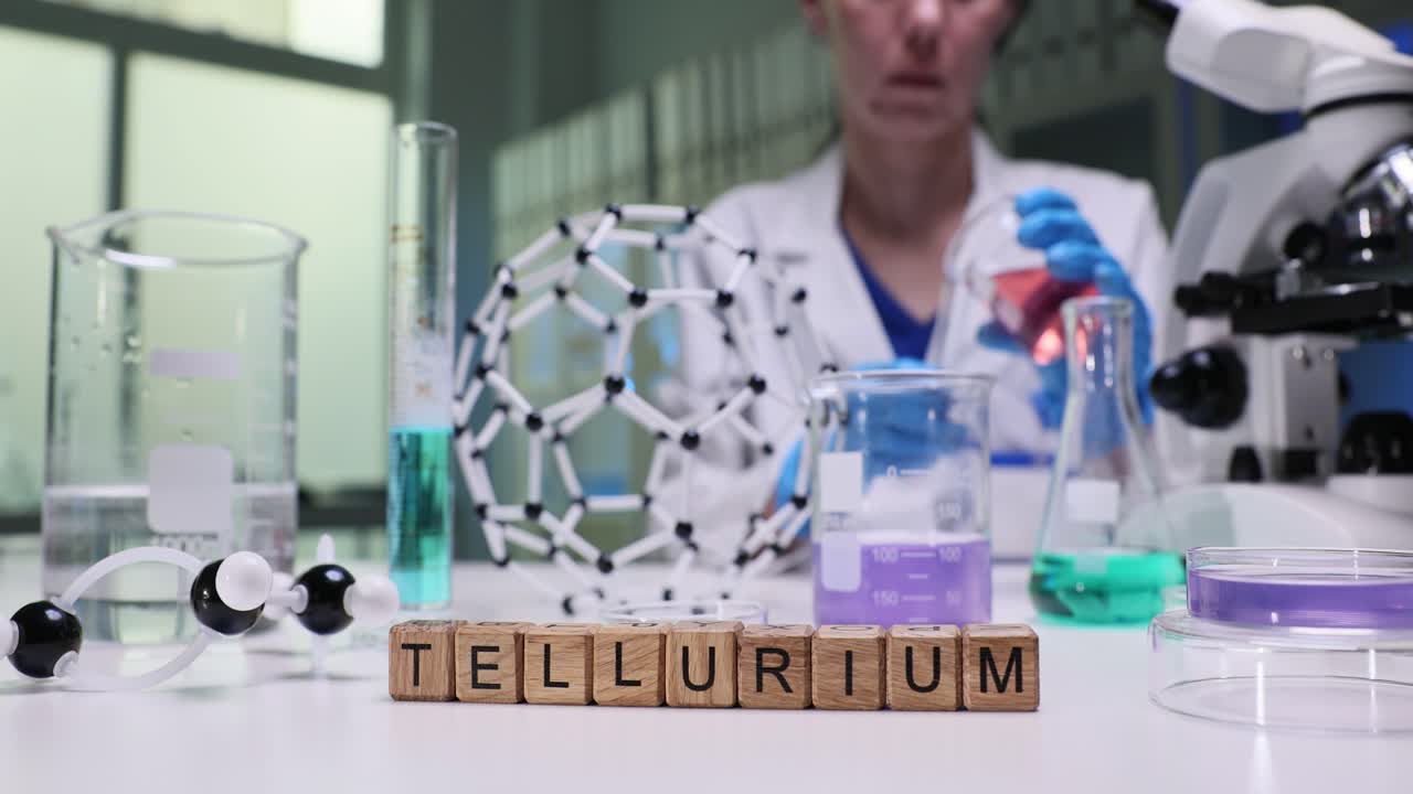 Scientist Working with Tellurium in a Chemistry Lab