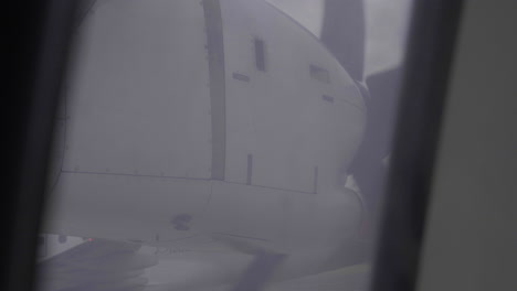 Airplane starting engines, propeller spinning in Dar es Salaam international airport