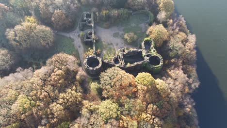 liverpool castle replica ruins in autumn rivington woodland nature landmark aerial tilt up view descending