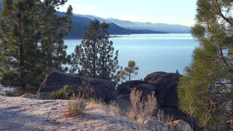 beautiful establishing shot of lake tahoe, california, nevada, sierras in winter with snow