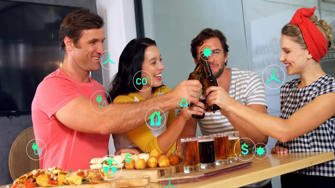 Four friends raising beer bottles launching green icons celebrating clean energy progress