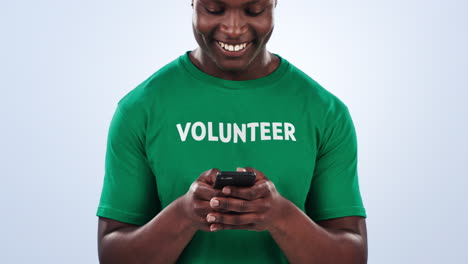 Volunteer-hands,-phone-and-happy-black-man-typing