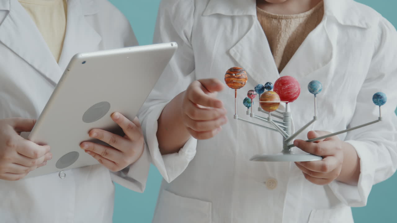 Unrecognizable Children Playing Scientists