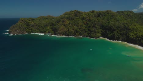 drone footage of englishman's bay with fishing boats in the bay