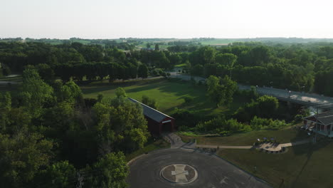 Aerial-Panoramic-View-Of-Covered-Bridge-Park-During-Sunny-Day-In-Zumbrota,-Minnesota,-United-States