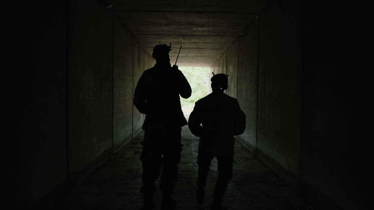 Silhouettes of Ukrainian Soldiers Emerging from Secret Bomb-Proof Bunker