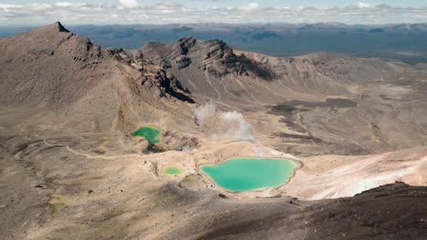 emerald lakes of a volcanic crater in new zealand