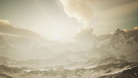 panorama of high snow mountains at sunset