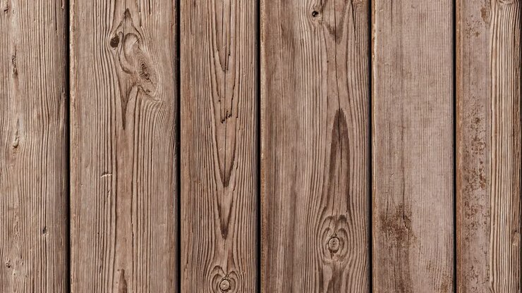 Seamless looping motion. Background from smooth old wooden planks. Natural aging outdoors under the sun and rain. Vertically oriented video.