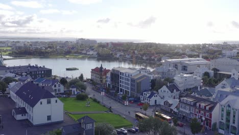 traditional iceland buildings at lækjargata street with bright sunshine in sky