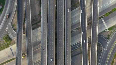 aerial top view of highway, transport city junction road with car on intersection cross road