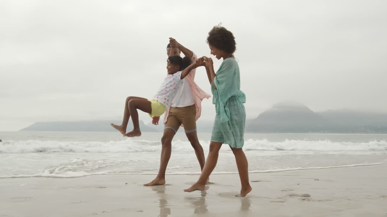 Family enjoying free time by the sea