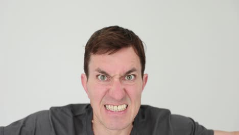 man expressing various strong emotions