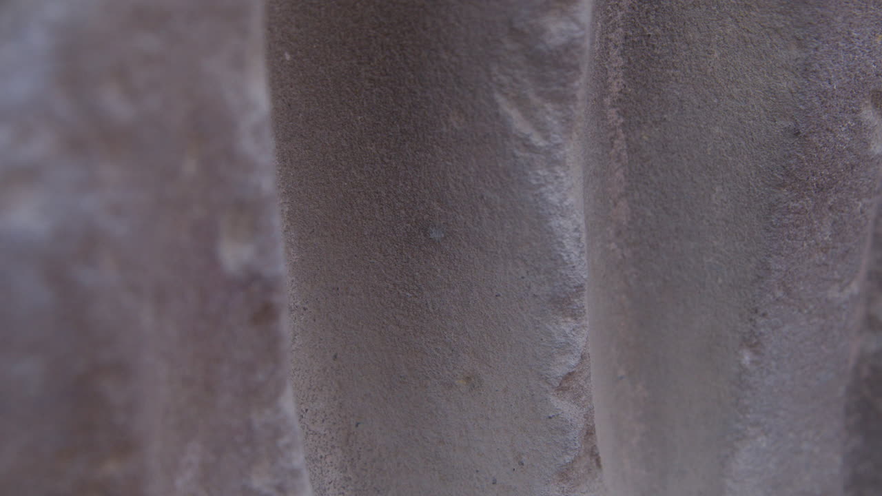 Close-up view of a textured surface, potentially a historical structure in Dendera, Egypt