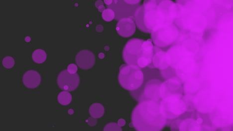 Purple-glitters-and-particles-on-black-background