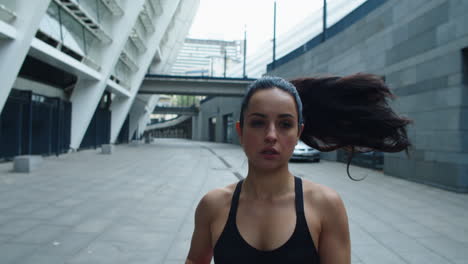 portrait of sportswoman running