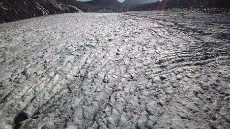 Glacier-view-with-drone-in-the-swiss-alps,-high-altitude,-Switzerland,-aerial