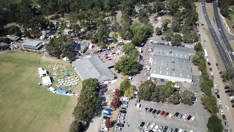 Aerial-view-of-a-festival-in-the-outer-suburbs-of-Melbourne,-Victoria,-Australia