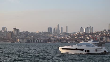 istanbul cityscape with yacht on the water