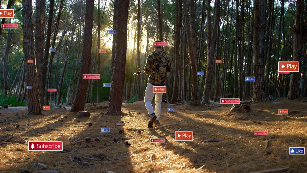 Man filming with gimbal in forest, showing floating Subscribe, Like, Play buttons for social media