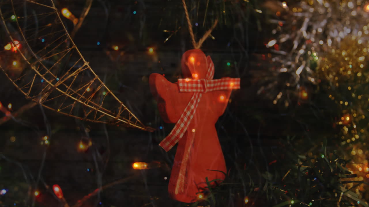 Animation of christmas tree with decorations and flickering fairy lights