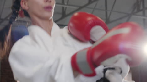 young woman doing martial arts