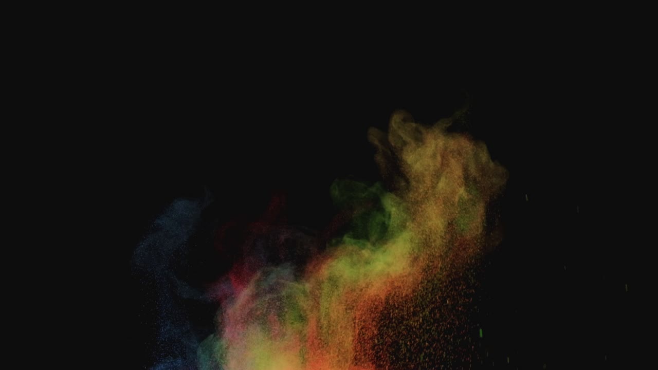 O respingo de partículas coloridas. Câmera lenta