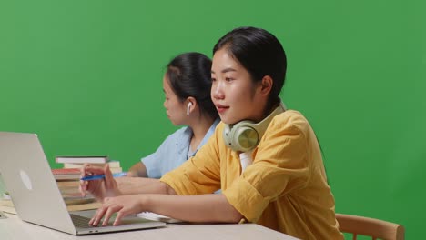 two students studying online