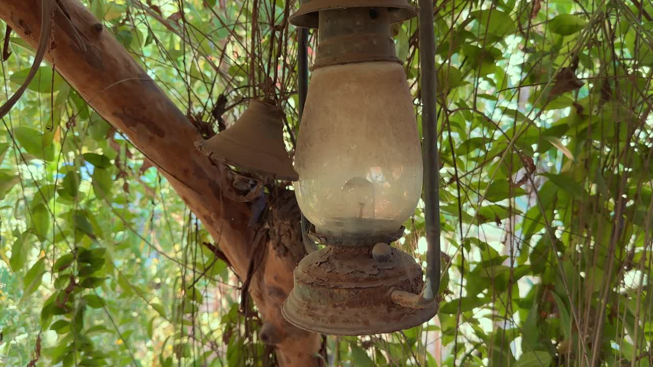 Closeup shot of Vintage Kerosene or oil lamp hanging outdoors