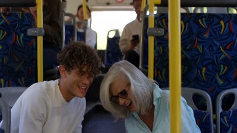 Commuters-using-laptop-while-travelling-in-bus-4k