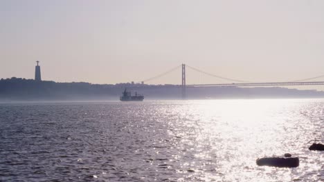 lisbon river  with boats at down during autum
