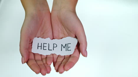 Hands-With-The-Inscription-Help-Me-On-A-White-Background