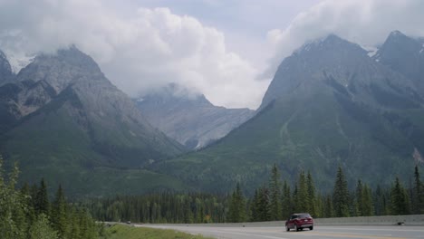 highway mountain pass in yoho national park, british columbia with a stunning view of the mountains.