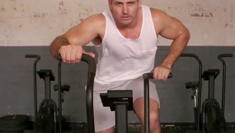 Fit-man-working-out-on-the-exercise-bike