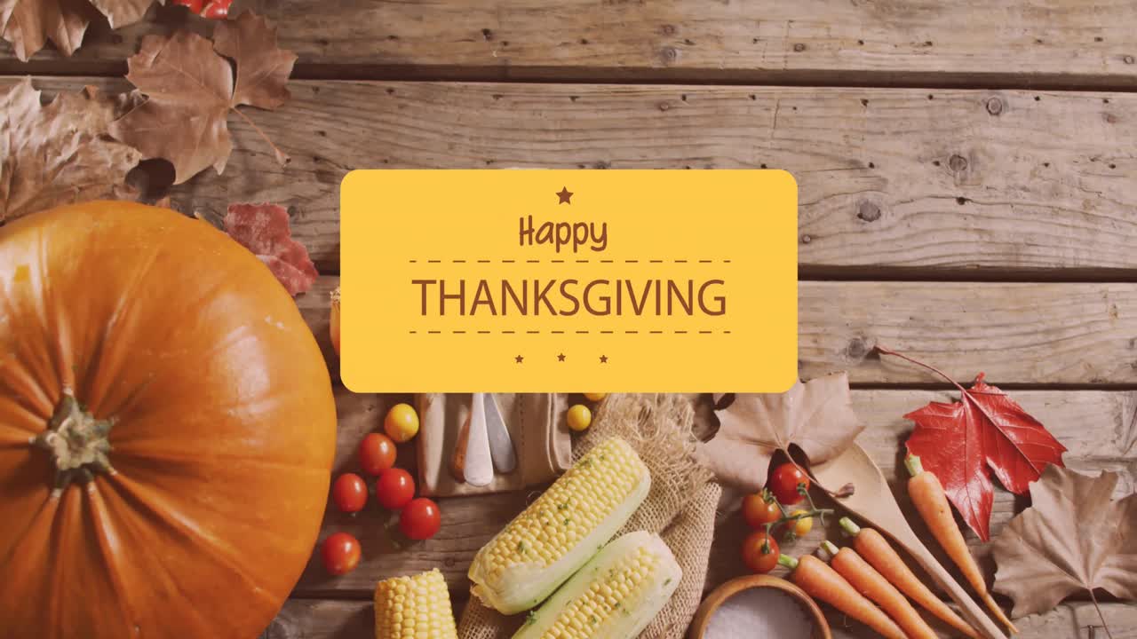 Animation of happy thanksgiving day text over vegetables