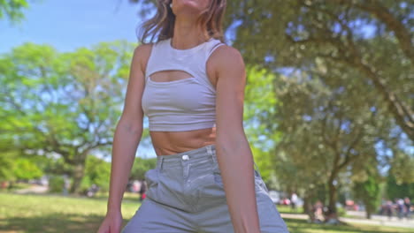 woman dancing in a park