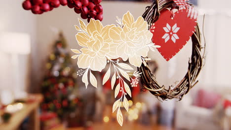 animation of flower icon over christmas decorations