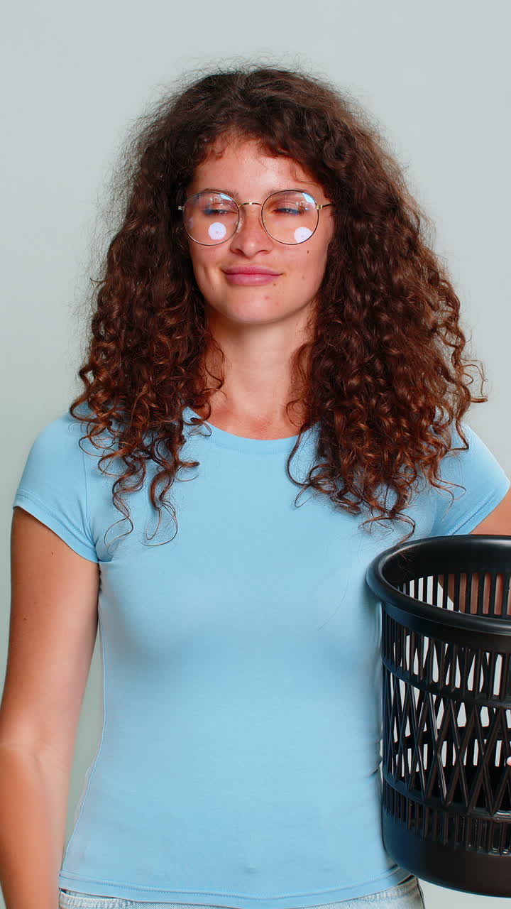 Woman dramatically taking off glasses throwing trash humorous funny rejecting disappointed gesture