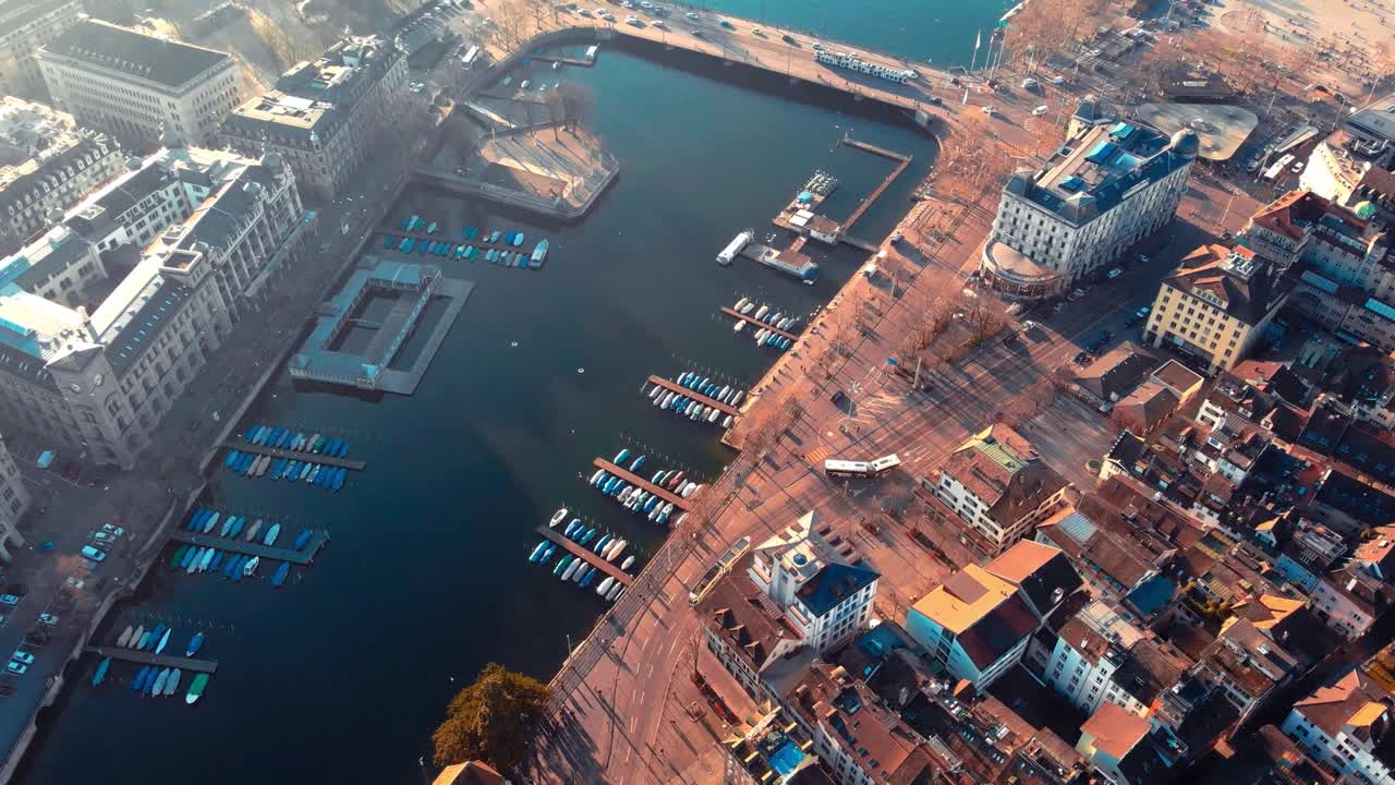 Aerial over Zurich Old Town and Limmat River boats