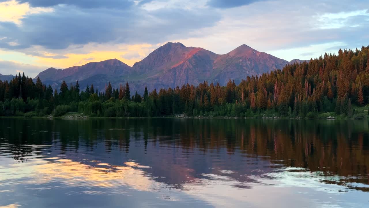 Ruby Peak Kebler Pass Lost Lake campground paddle boarding vibrant sunset golden hour spring summer aerial drone Crested Butte Colorado Three Lakes Trail Paonia Gunnison National Forest calm water