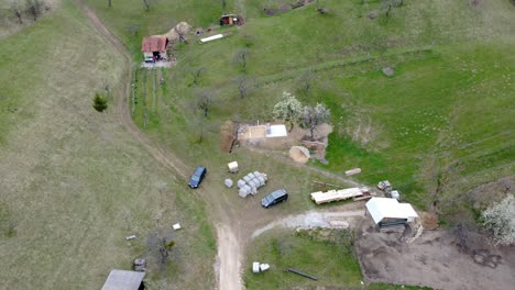 a secluded cabin in the middle of a pasture