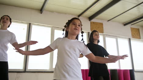 teacher and pupils in dance class