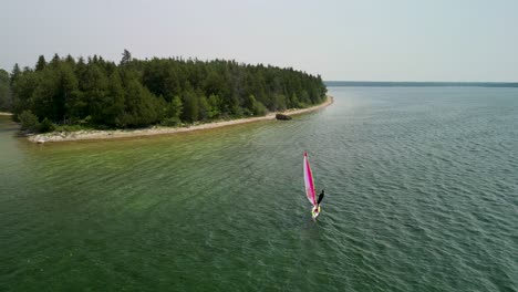 aerial view of windsurfer along shoreline on lake huron, michigan