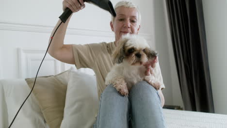 woman and dog at home