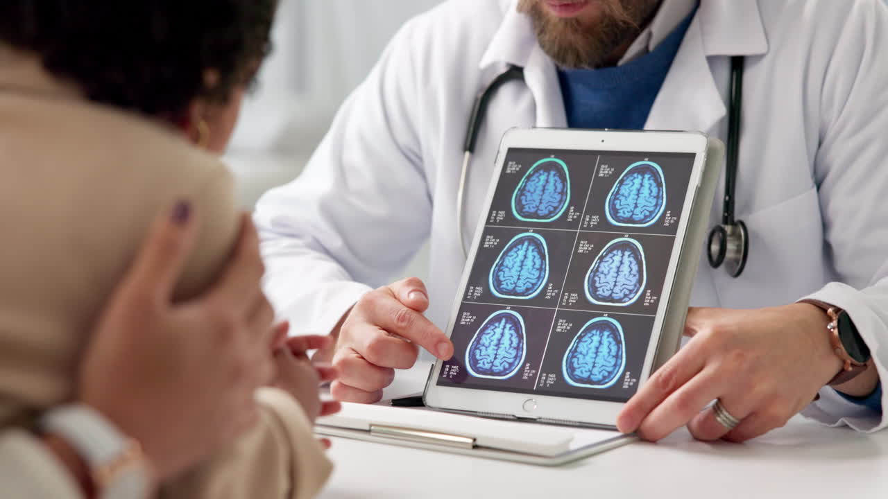 Doctor explaining brain scan to patient